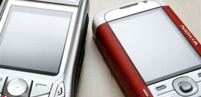Nokia снизила выручку и объемы продаж - Фото