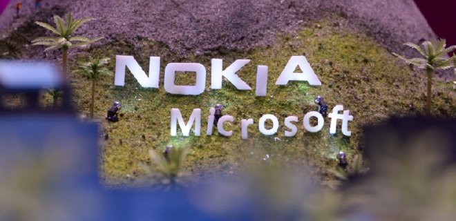 Microsoft и Nokia закроют сделку на месяц позже  - Фото