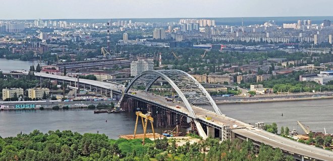 Ущерб на 4,5 млн грн. Прокуратура проводит обыски по делу о Подольском мосте в Киеве - Фото