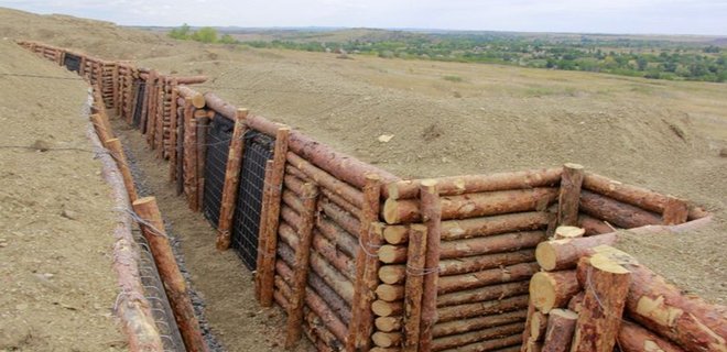 Аграриям Донбасса могут начать платить за военные сооружения на их земле - Фото