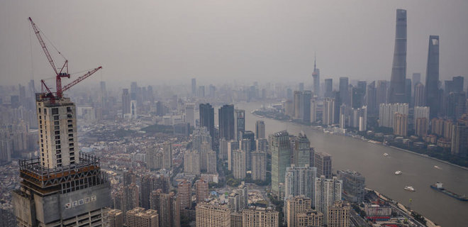 Китайська Evergrande відновила роботу на десятку будівельних об'єктів - Фото