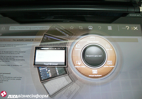 "Живые" фото ноутбука с двумя экранами "Acer Iconia"